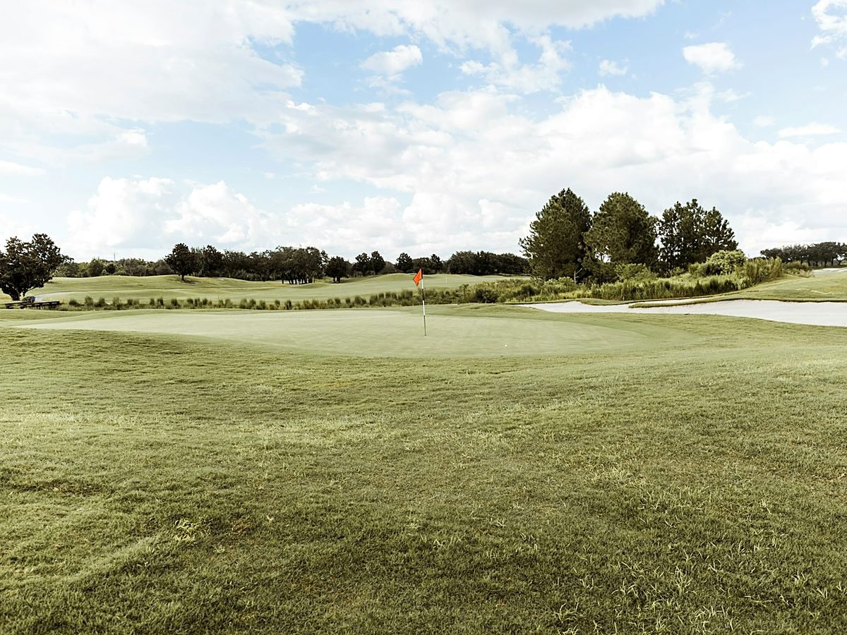 Close-up detail of the golf course fairway and green at Greenmere